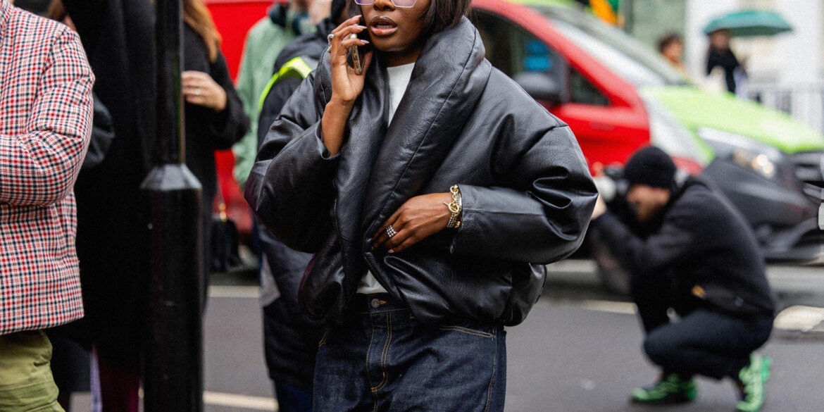 A guest wears black puffer jacket outside JW Anderson during London Fashion Week 2024 in London, England. Photo by Christian Vierig/Getty Images